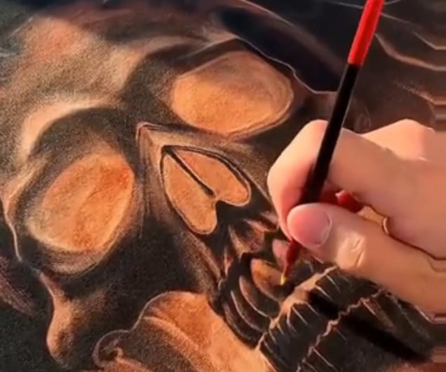 bleach artist named “nik vikond” turns this black hoodie into a piece of art