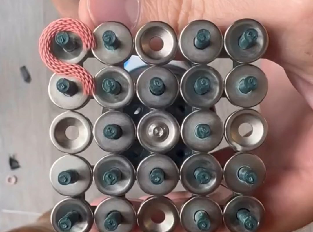 A mechanical snake moving using rotors to move it across the surface