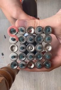 A mechanical snake moving using rotors to move it across the surface