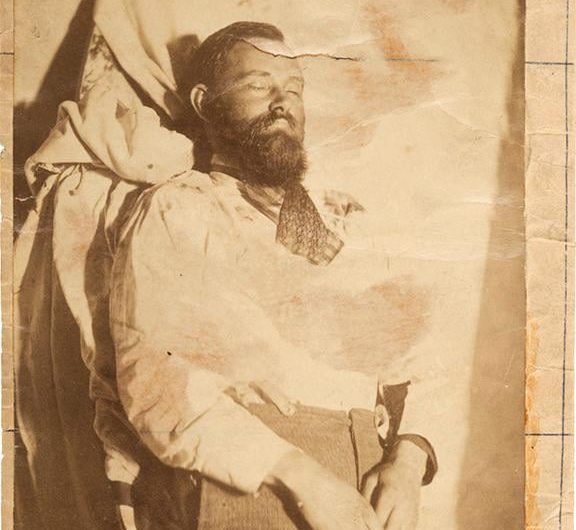 After outlaw Jesse James was killed in 1882, photographs of his corpse were sold to the public for 50¢. This is one of them.