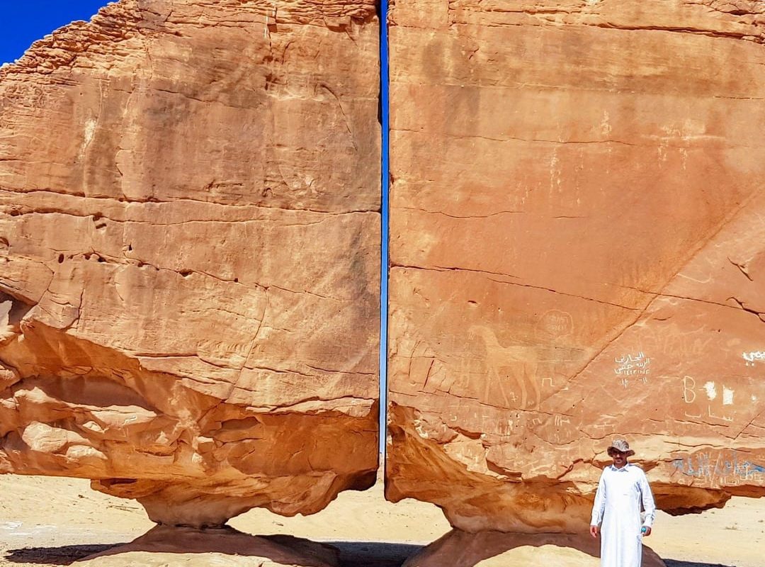 Al Naslaa Rock, Saudi Arabia. split almost perfectly in half by nature
