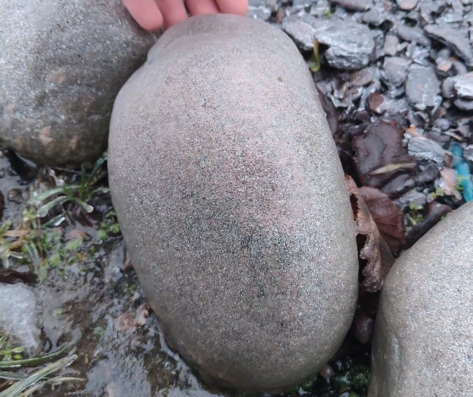 All rocks in my garden were like that after an ice storm last night - I guess I know what I'll do for the next 5 hours!