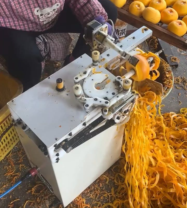 Automated peeling of citrus fruits