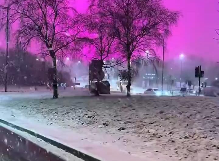 Birmingham, UK Sky Turns Neon Pink — Low Clouds/Snow Reflected Pink LED Grow Lights From a Local Football Stadium, According to BBC Weather Experts