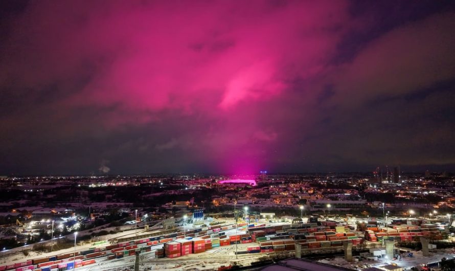 Birmingham experienced a rare phenomenon caused by LED lights from Birmingham City’s football ground reflecting off falling snow, creating a pink haze across the sky