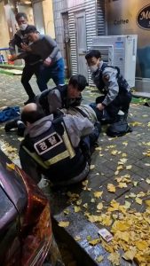 Citizen helping officer