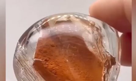 Fine sand and water trapped inside an enhydro quartz crystal for hundreds of millions of years