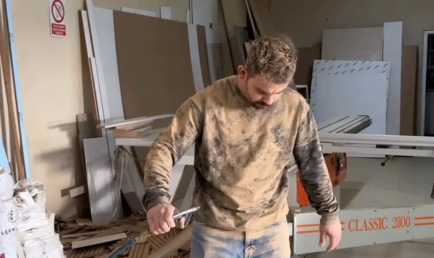 Guy uses air pressure to clean dust off