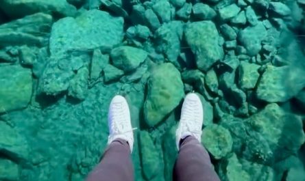 Ice skater glides on wild ice