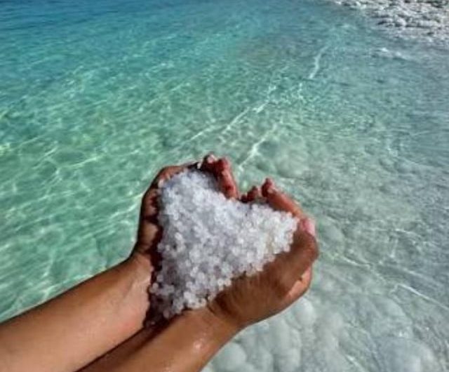 In the Dead Sea, there is an entire beach full of round salt pearls that look like white sand.