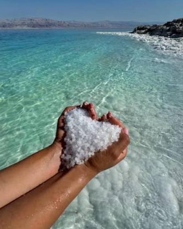 In the Dead Sea, there is an entire beach full of round salt pearls that look like white sand.