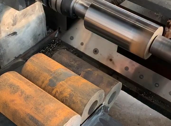 Machine finishing of iron products