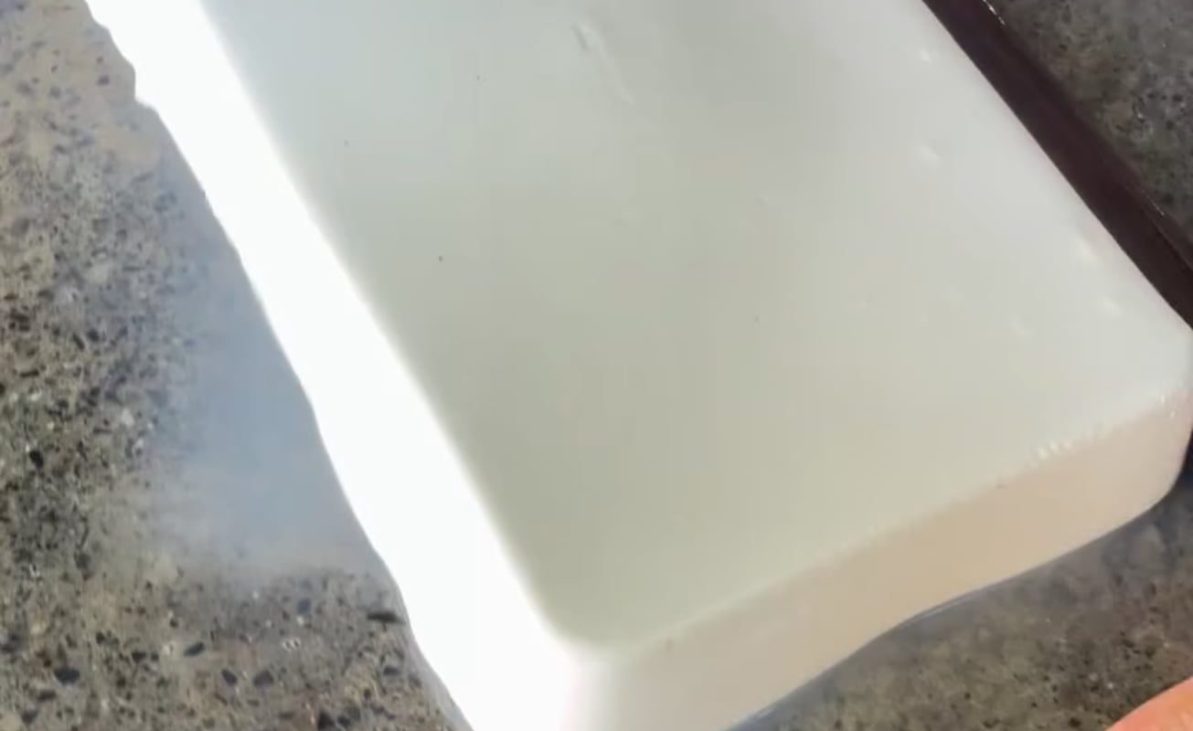 Manually pressing rubber into sheet