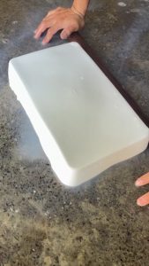 Manually pressing rubber into sheet