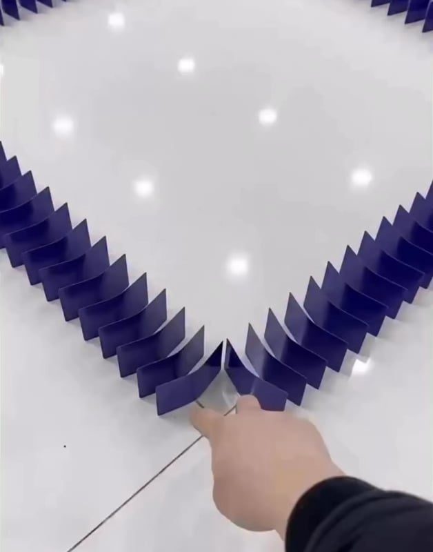 Over 2 months of work for this long domino chain to be made