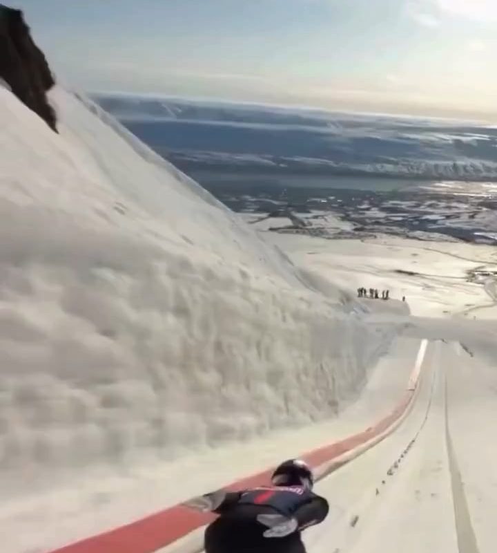 Ryōyū Kobayashi getting huge air as he breaks the world record for the longest ski jump