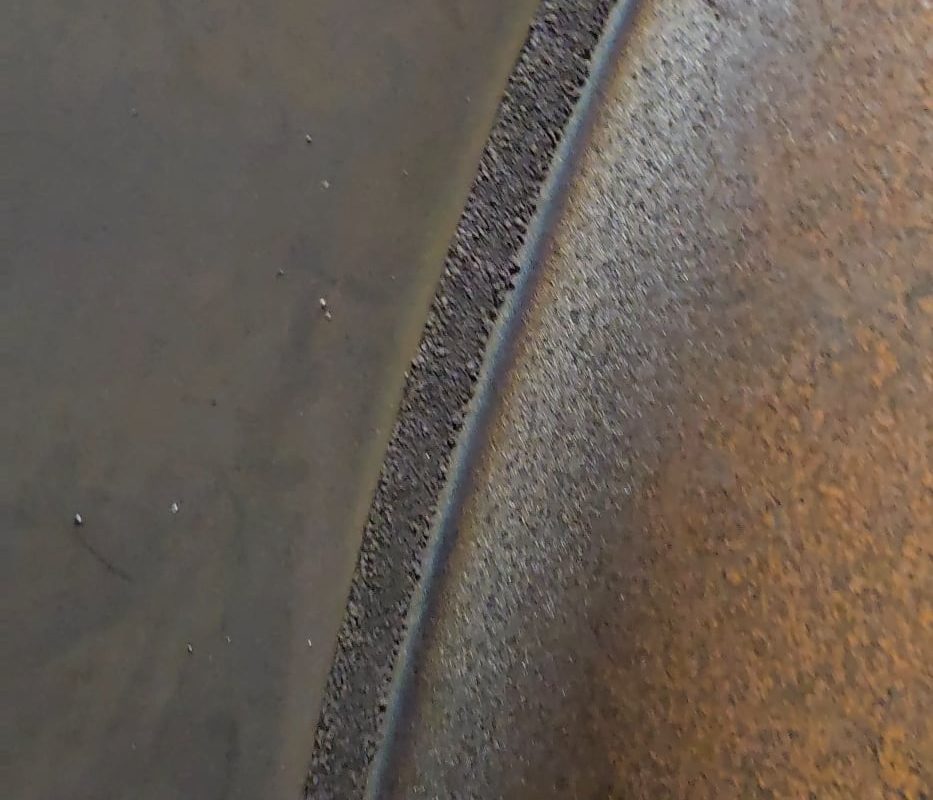 Sub arc welding Slag* removal.