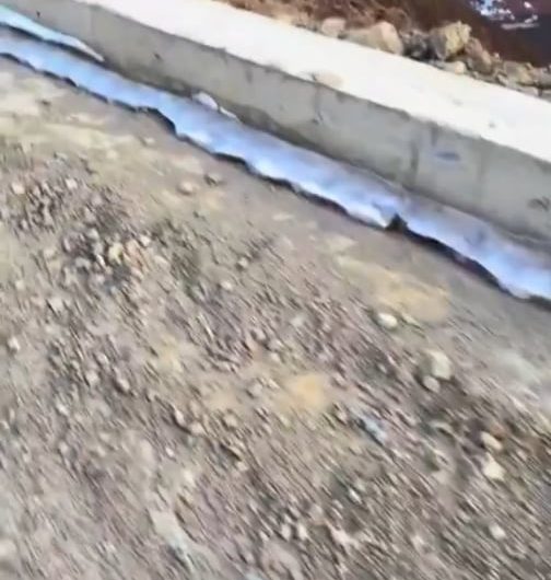 Sunrise lighting up snow capped mountains