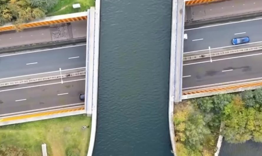 The Veluwemeer Aquaduct in Netherlands, is one of 41 water bridges in the country letting boats pass over the road while vehicles drive safely below