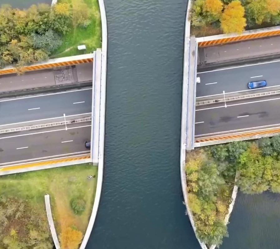 The Veluwemeer Aquaduct in Netherlands, is one of 41 water bridges in the country letting boats pass over the road while vehicles drive safely below