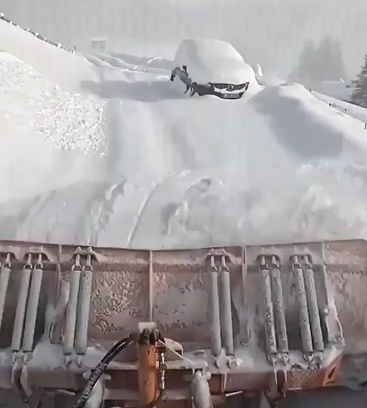 The quiet rhythm of a snowplough.