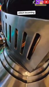 The way this knight opens his helmet.