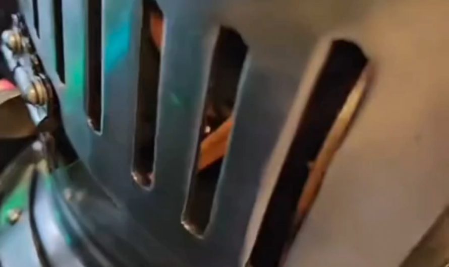 The way this knight opens his helmet.