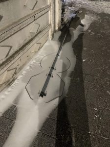 This fallen sign covered in snow