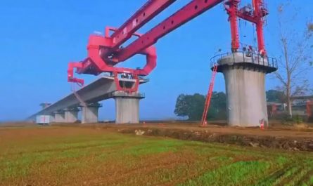 This is a bridge girder machine which is used by construction crews to individually place blocks of concrete during the development process
