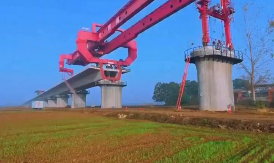 This is a bridge girder machine which is used by construction crews to individually place blocks of concrete during the development process