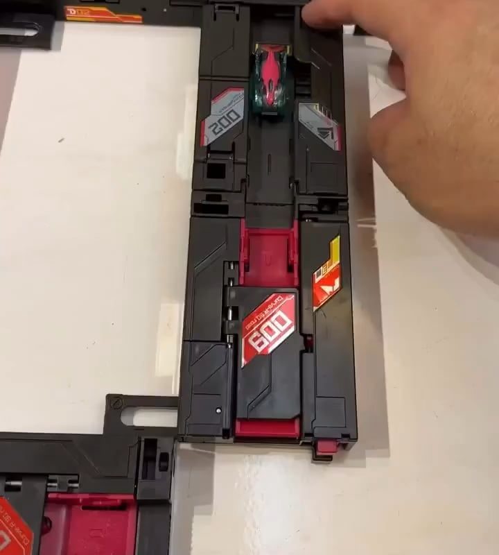 Two toy cars and track
