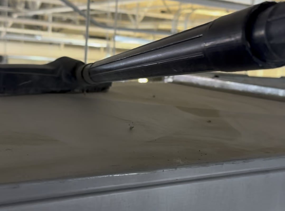 Vacuuming AC ductwork and static electricity is created making dust jump towards vacuum tube