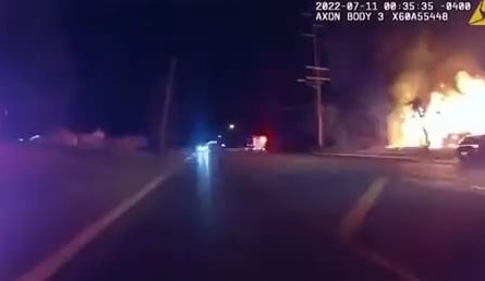 25 year old pizza delivery driver, Nick Bostic, runs into a burning house and saves four children who tell him another might be in the house. He goes back in, finds the girl, jumps out a window with her and carries her to a cop who captures the moment on his bodycam