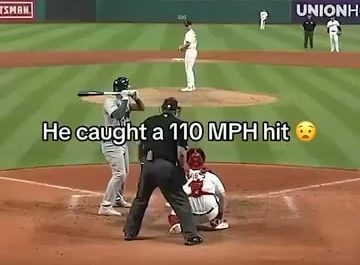 A baseball player caught a 110 MPH hit.