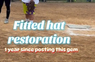 A guy restores an old baseball cap