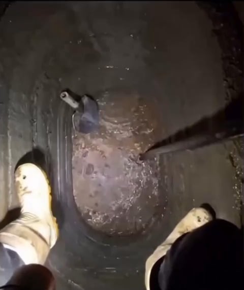 A really deep well, so deep it even have its own micro climate (the fog below).
