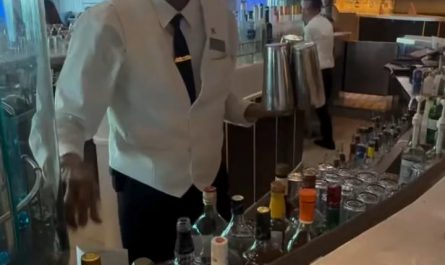 A waiter does a magic trick for the cherries.