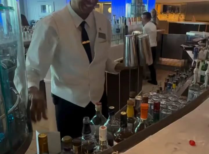 A waiter does a magic trick for the cherries.