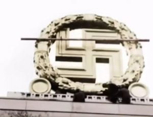 Allied soldiers destroy symbol on top of ZeppelinField, Nuremberg