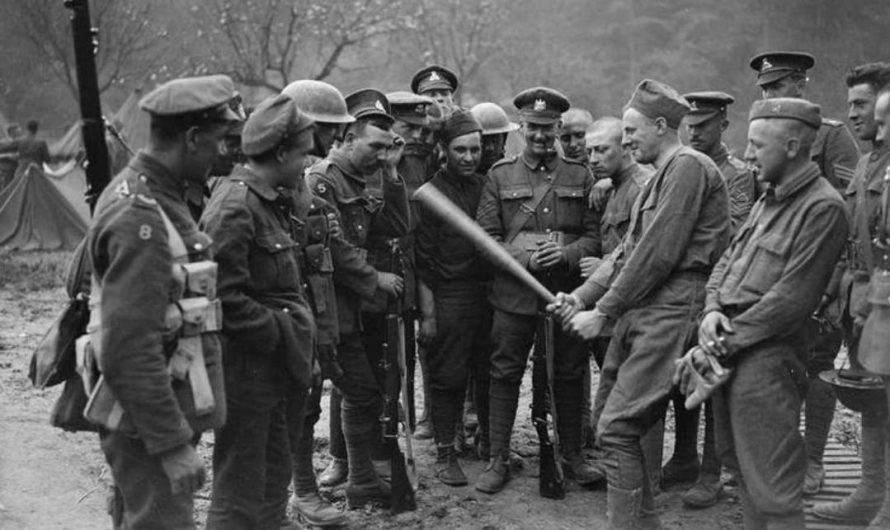 American soldiers explaining to British soldiers what the American game of baseball is like.