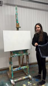 Artist Alex Demers shows one of her painting processes