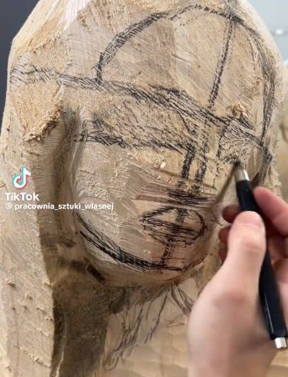 Artist Michał Kulig creates a stunning sculpture from wood.