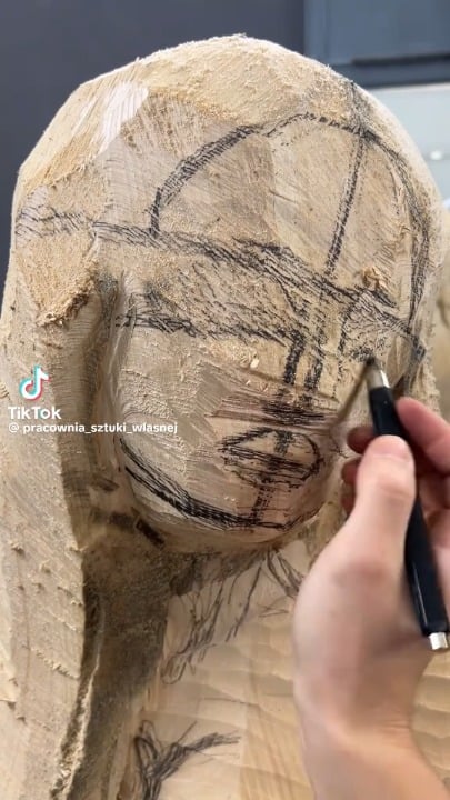 Artist Michał Kulig creates a stunning sculpture from wood.