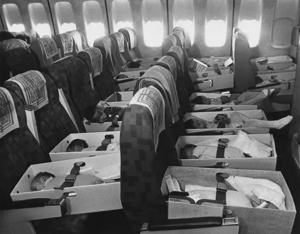 Babies, orphaned after the loss of their parents during the Vietnam war, are transported to the United States in 1975 in Operation Babylift.
