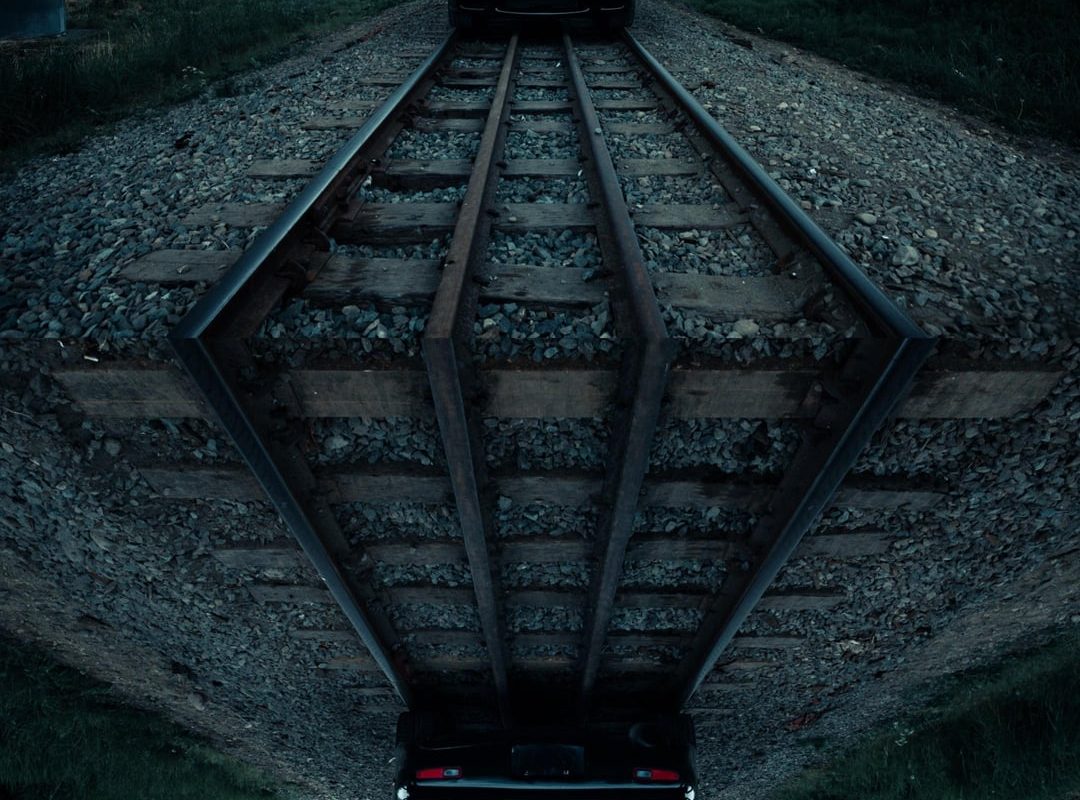 Balancing a car (RX7 FD) on a set of train tracks