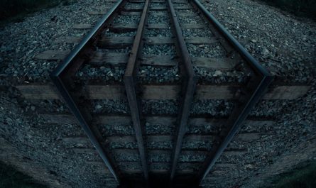 Balancing a car (RX7 FD) on a set of train tracks
