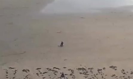 Banksy piece drawn on a beach in Scarborough