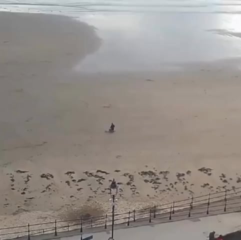 Banksy piece drawn on a beach in Scarborough
