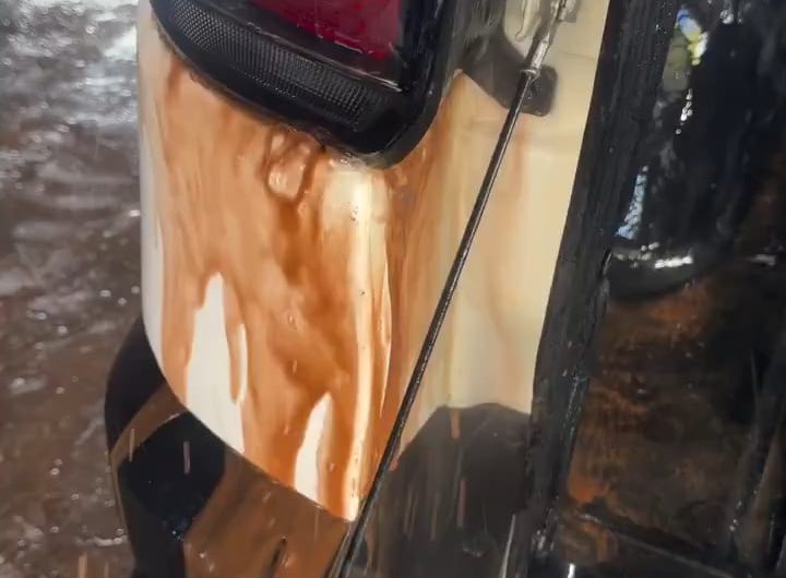 Cleaning behind the light