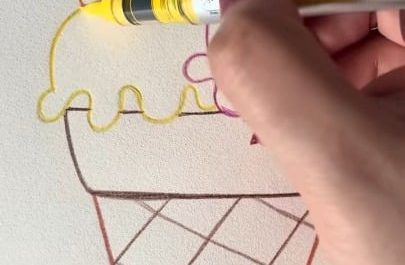 Coloring and outlining a simple drawing of an ice cream cone
